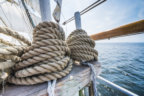 Wooden pulley and ropes on old yacht.