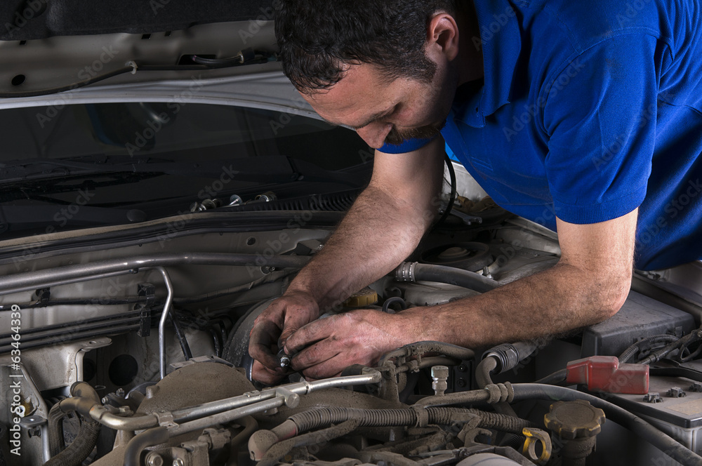 Repairman Working at Auto Repair Shop Repairman Working at Auto Repair Shop