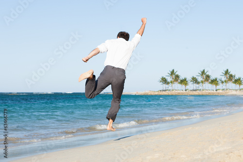 Man Jumping At Beach