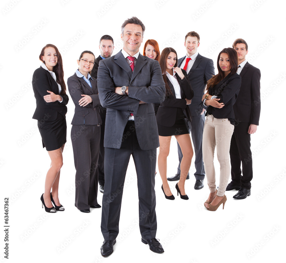 Senior business manager standing on front of his team Senior business manager standing on front of his team