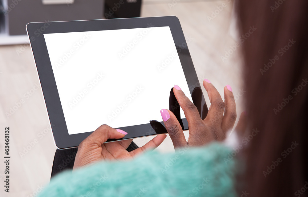 Woman Holding Digital Tablet At Home