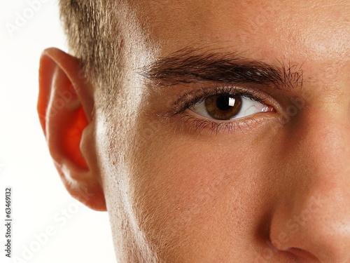 Human eye of man with long eyelashes close up