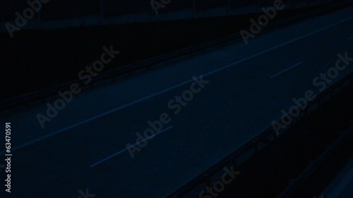 Car driving high way at night