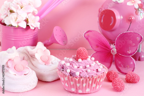 Cupcake and baby decoration in pink color