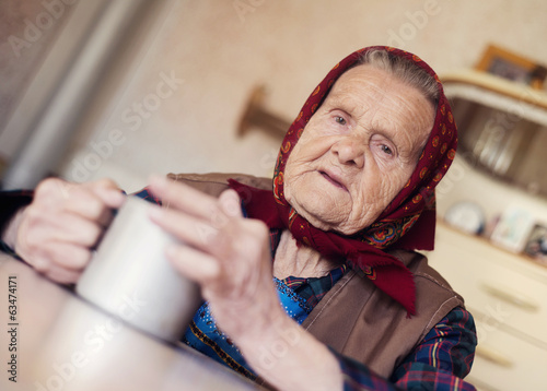 Old woman in the kitchen