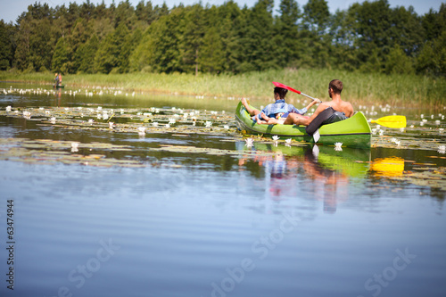 People boating on river