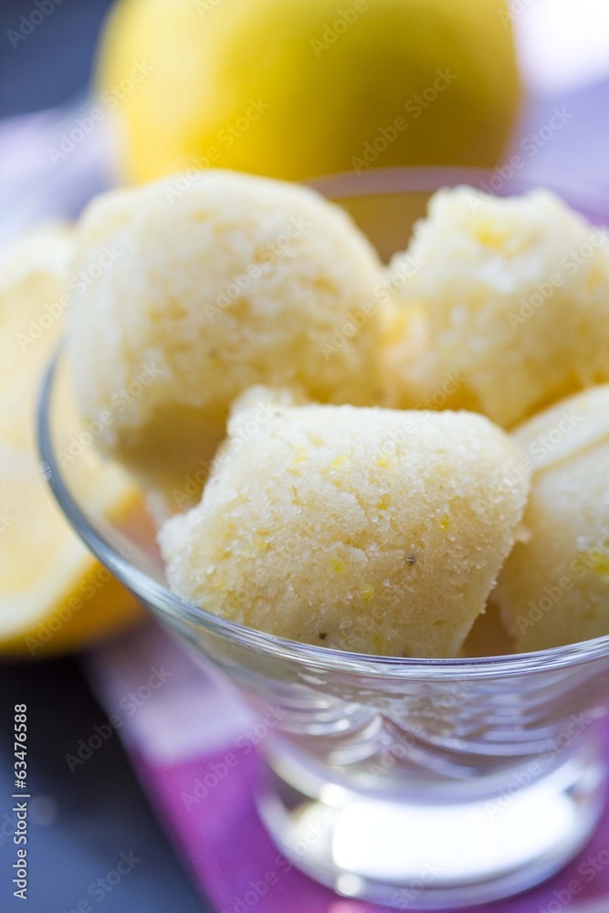 Lemon ice cream sorbet, balls in glass, refreshing summer diet Lemon ice cream sorbet, balls in glass, refreshing summer diet