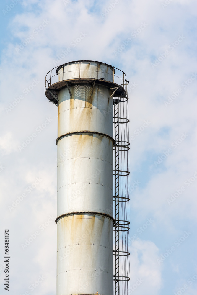 Factory Chimney Of Coal Power Plant Against Blue Sky Factory Chimney Of Coal Power Plant Against Blue Sky