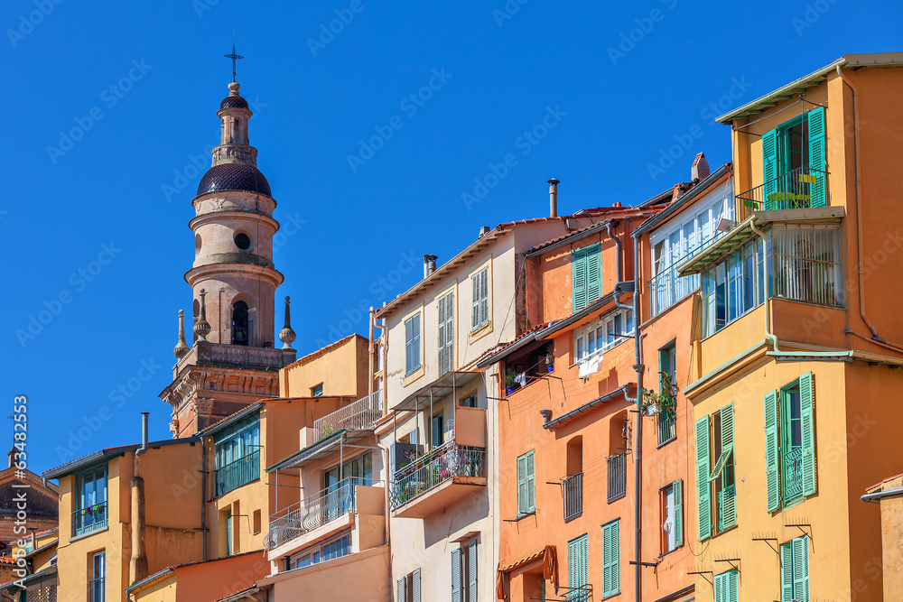 Colorful houses and belfry in Menton, France.