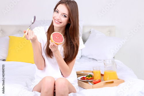 Young beautiful woman on be...