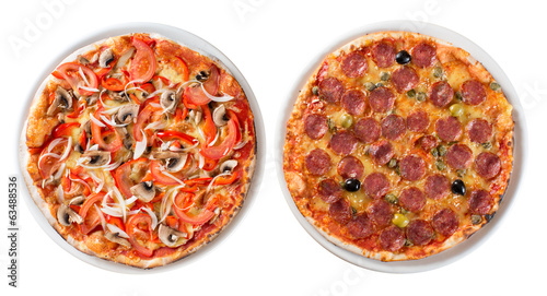 Two italian pizzas isolated on white top view