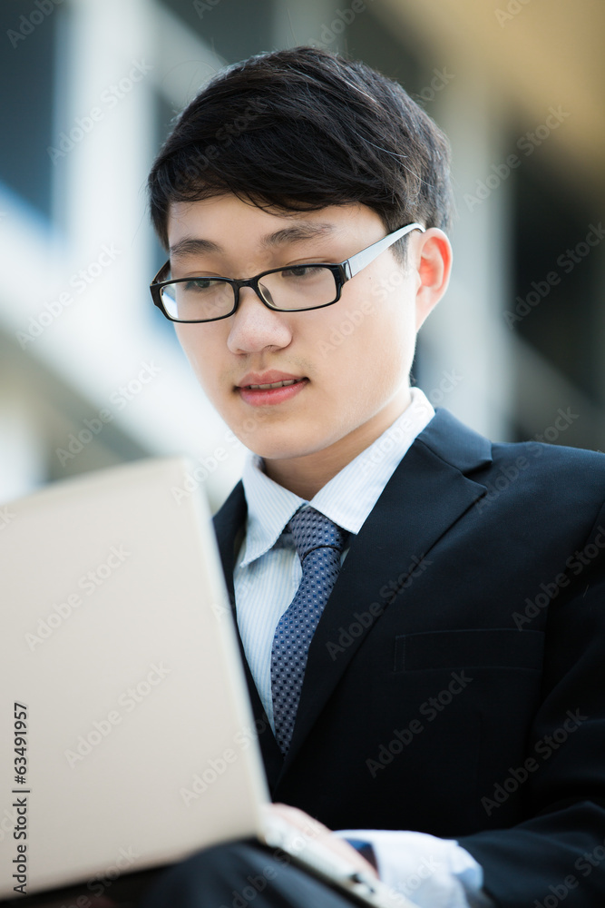 young businessman working outside young businessman working outside