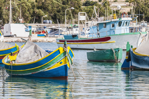 Traditional Luzzu boat at Marsaxlokk harbor in Malta. © Anibal Trejo