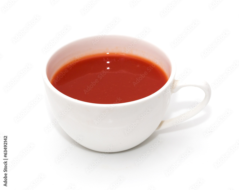 tomato juice in glass on white background tomato juice in glass on white background