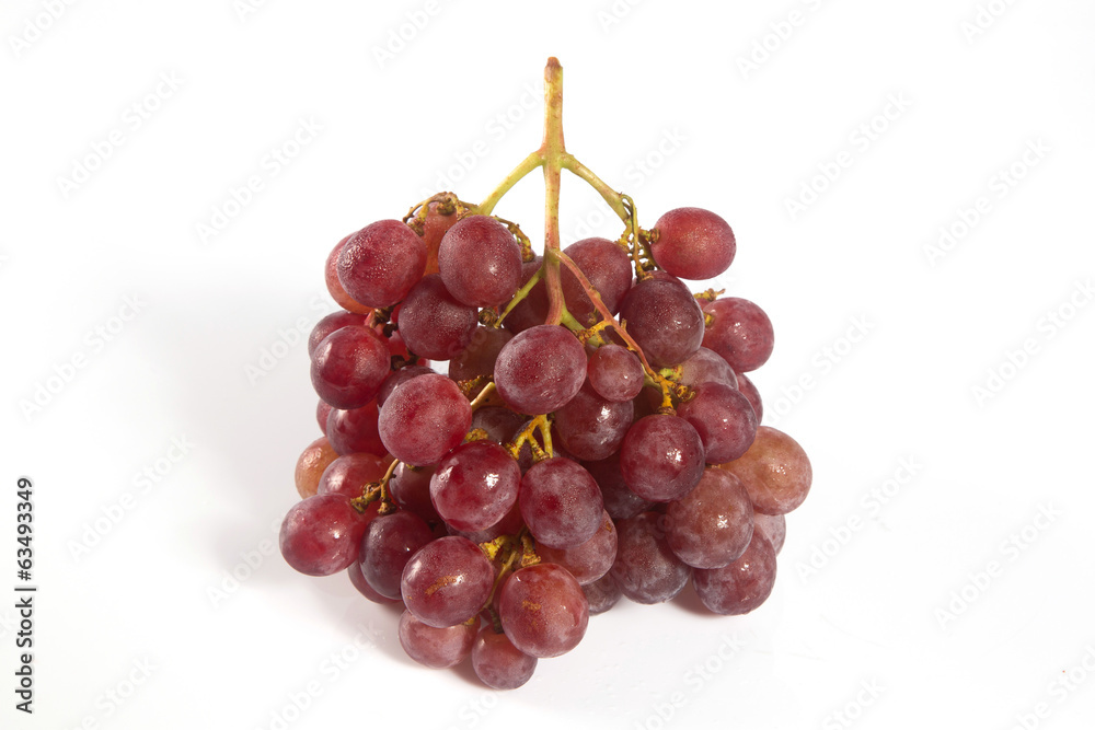 red grapes over white background.