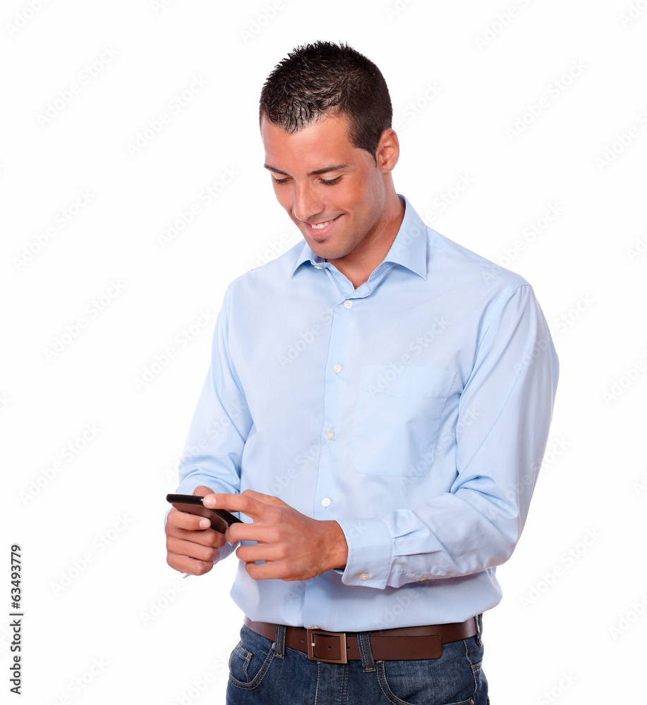 Handsome latin man sending a message Handsome latin man sending a message