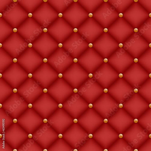 Seamless red quilted background with golden pins.