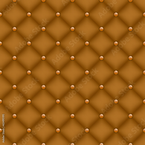 Seamless mustard color quilted background with golden pins.