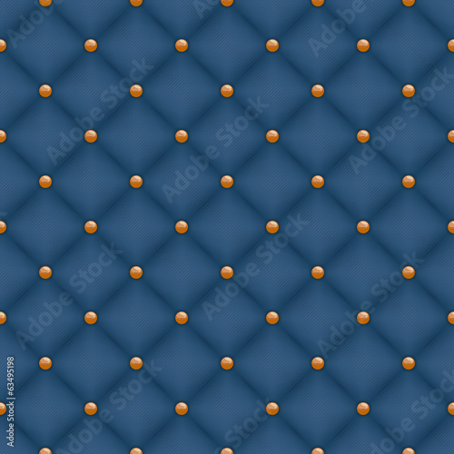 Seamless dark blue quilted background with golden pins.