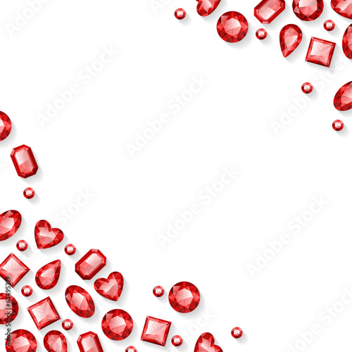Frame of red sparkle gemstones on white background.