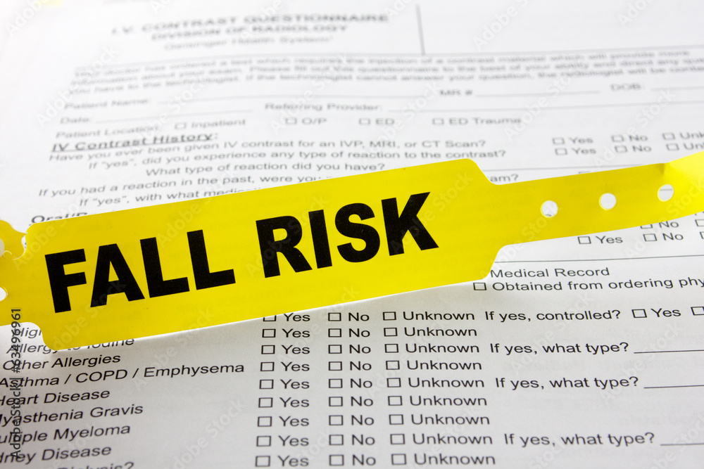 Fall Risk Bracelet On Top Of Hospital Questionnaire Stock Photo Adobe Stock