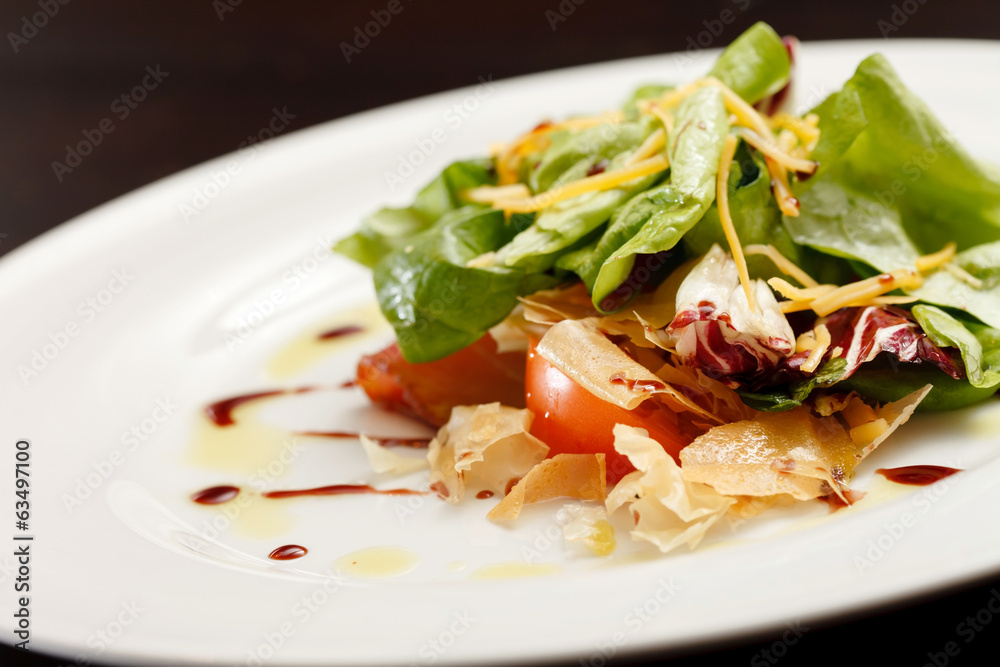 Green salad with thin slices of ham Green salad with thin slices of ham