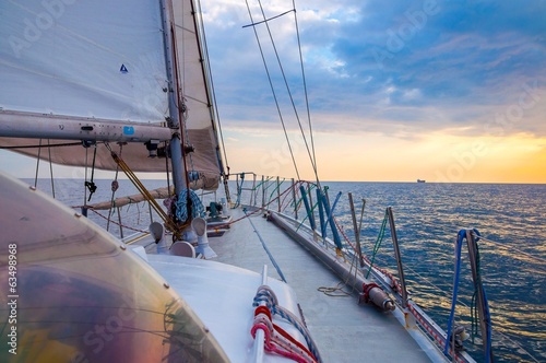 Fototapeta Naklejka Na Ścianę i Meble -  Sailing into sundown