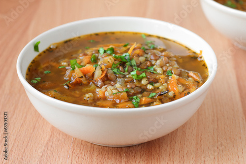 Traditional vegan turkish soup with bulgur and lentils