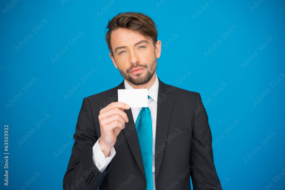 handsome businessman showing blank business card handsome businessman showing blank business card