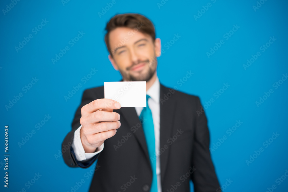 handsome businessman showing blank business card handsome businessman showing blank business card
