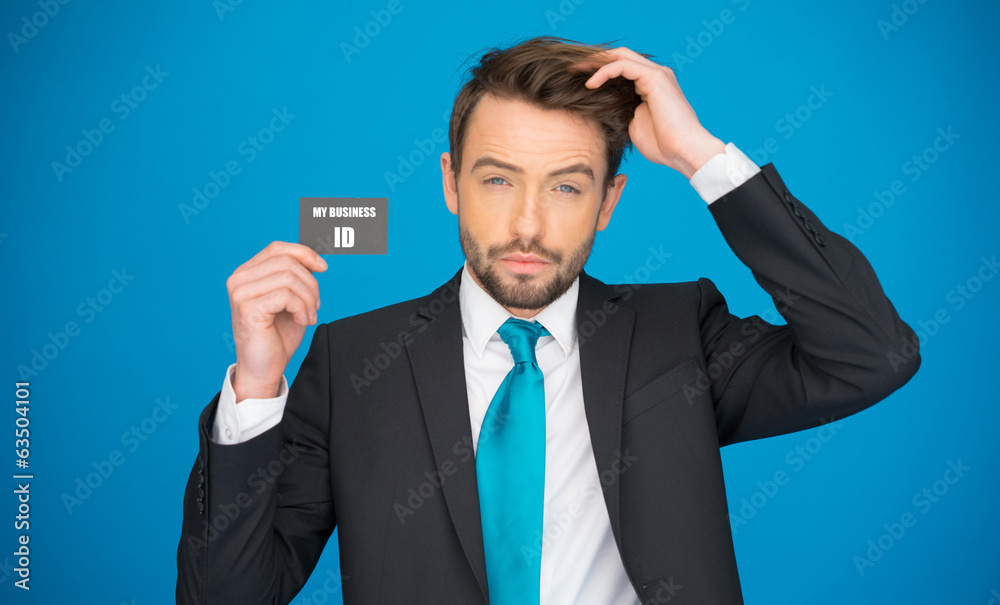 handsome businessman showing blank business card handsome businessman showing blank business card