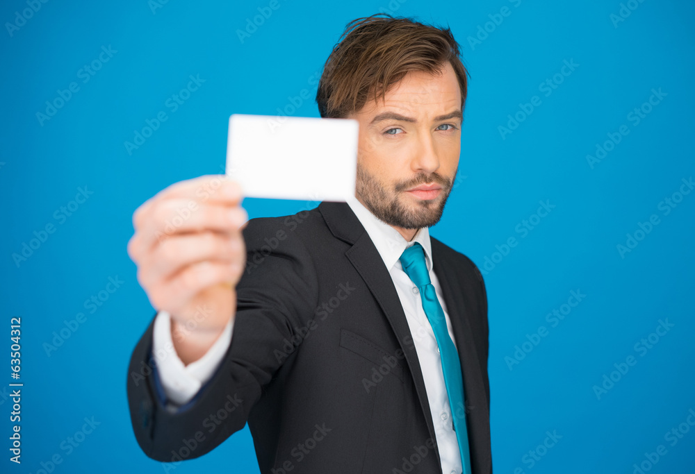 handsome businessman showing blank business card handsome businessman showing blank business card