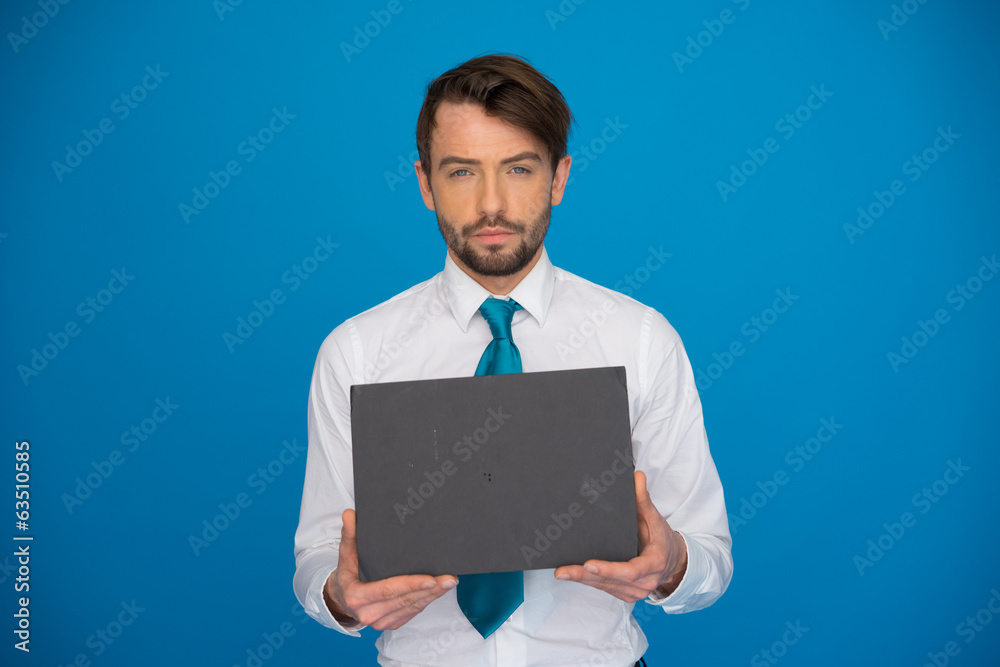 Businessman holding blank poster Businessman holding blank poster