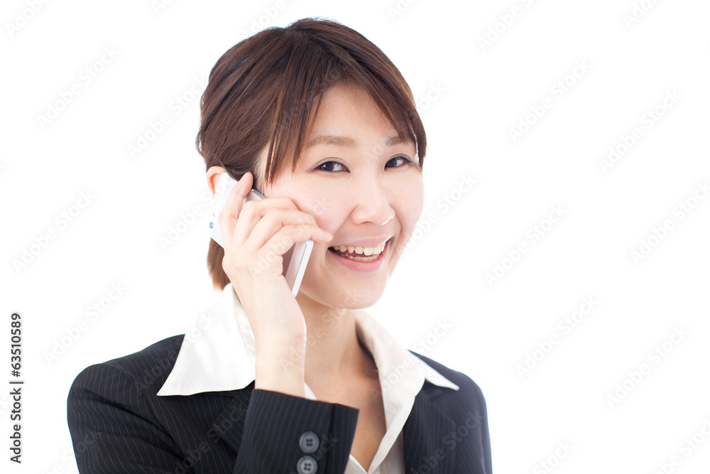 携帯電話で話す女性 携帯電話で話す女性