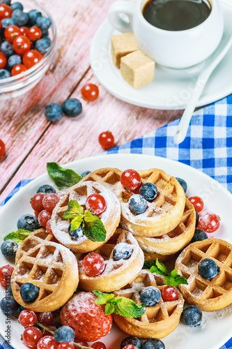waffles with berries on the table