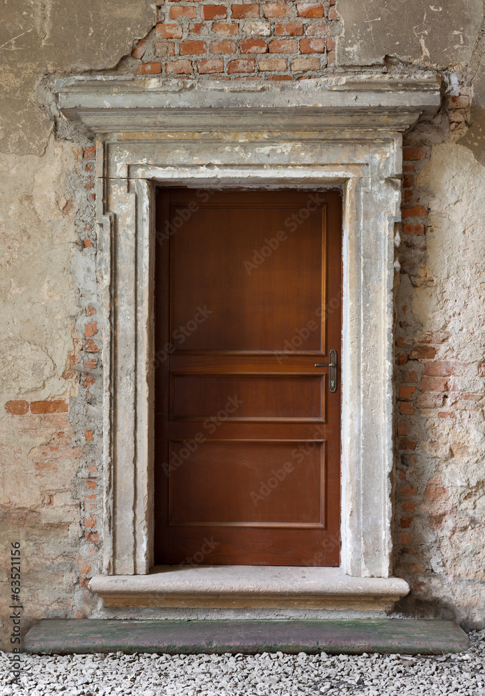 old wood made doors on abandoned background old wood made doors on abandoned background