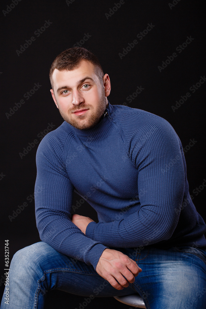 Portrait of a young business man, dressed in a blue shirt Portrait of a young business man, dressed in a blue shirt