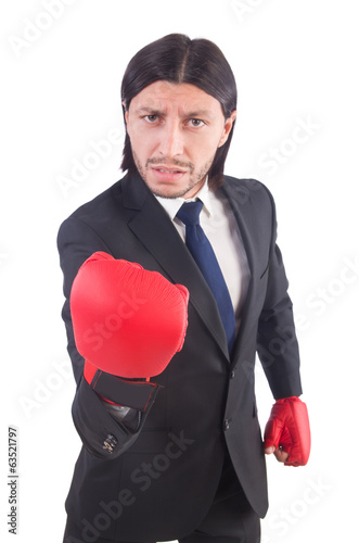 Businessman with boxing gloves on white © Elnur