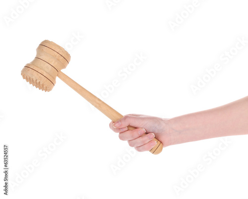 hand holds Wooden meat mallet