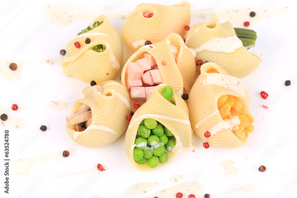 pasta shells stuffed with vegetables and sausage