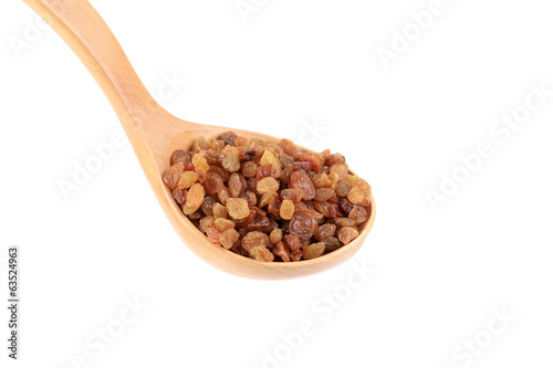 Wooden spoon with raisins
