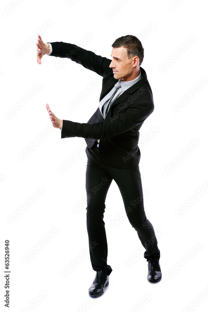 Handsome Businessman pushing copy space Handsome Businessman pushing copy space