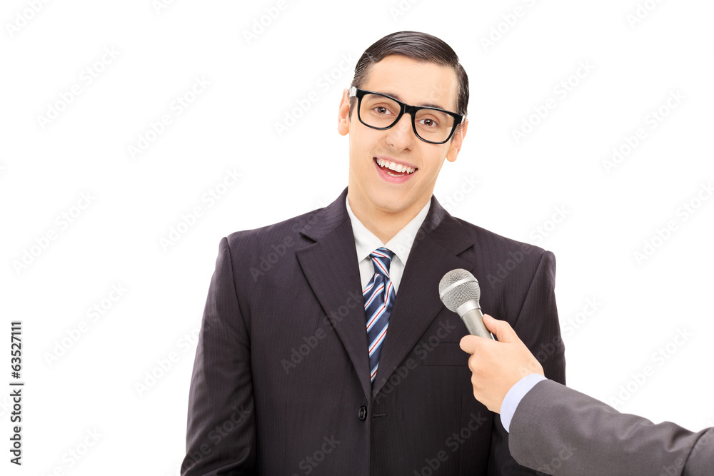 Man being interviewed Man being interviewed