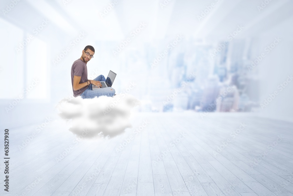 Composite image of man wearing glasses sitting on cloud using la
