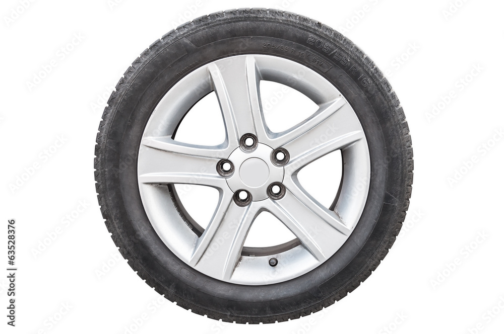 Four car tires on white background