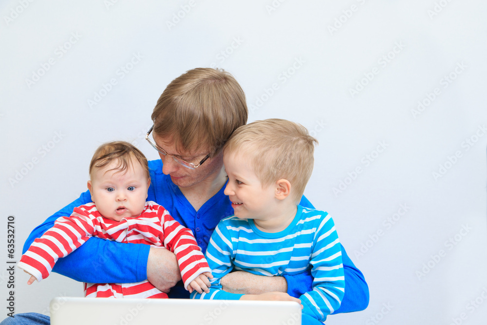 father with kids with laptop at home father with kids with laptop at home