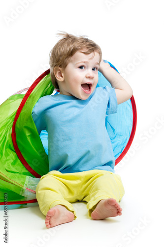cheerful baby playing in a ...