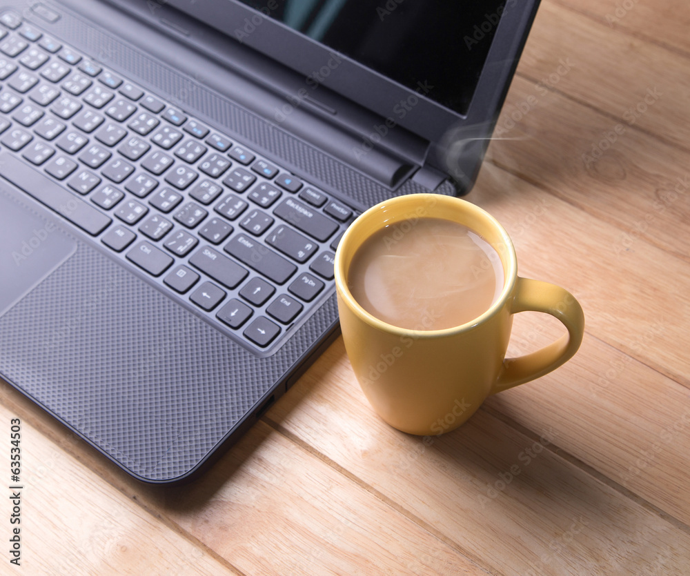 Coffee cup with the computer. Coffee cup with the computer.