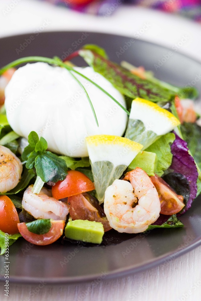 Fresh salad with shrimps, tomatoes, herbs, avocado, poached egg Fresh salad with shrimps, tomatoes, herbs, avocado, poached egg