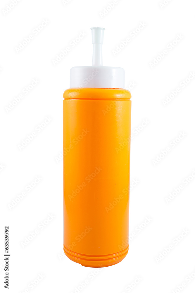 Plastic bottle of Ketchup sauce isolated over white background Plastic bottle of Ketchup sauce isolated over white background